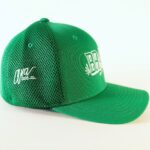 Green flex fit hat, viewed from the right side. Text on the side reads "Ava Said".