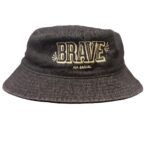 Front of black jean material Brave bucket hat